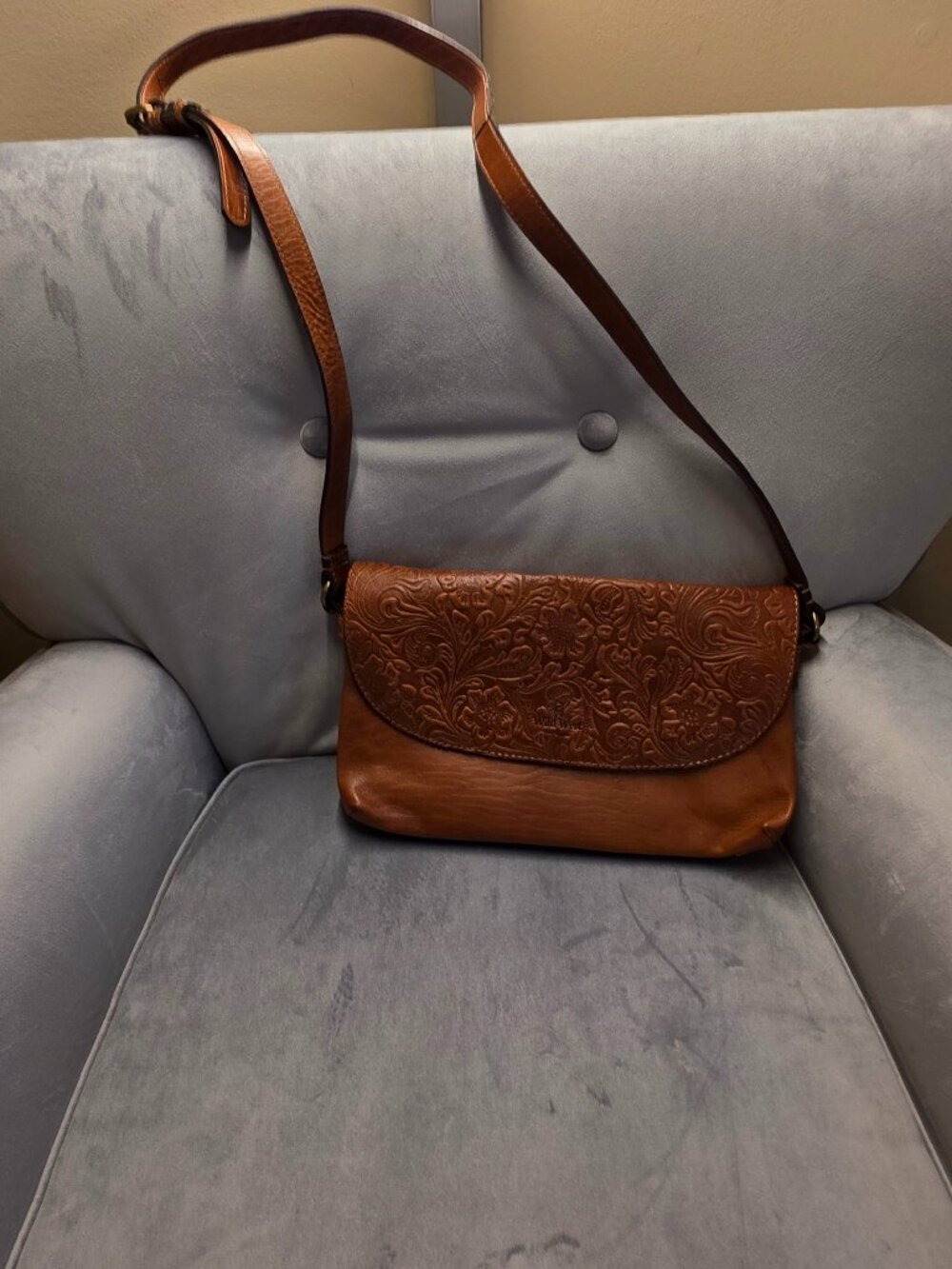 Tooled leather bag plaid interior
